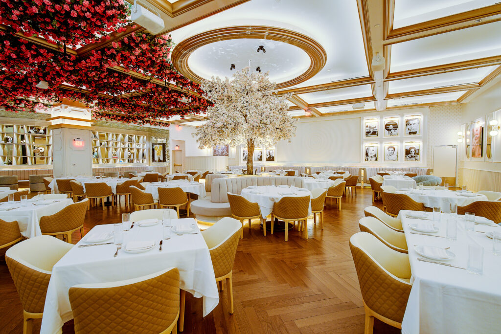 Villa Azur main dining room with floral ceiling and blossom tree