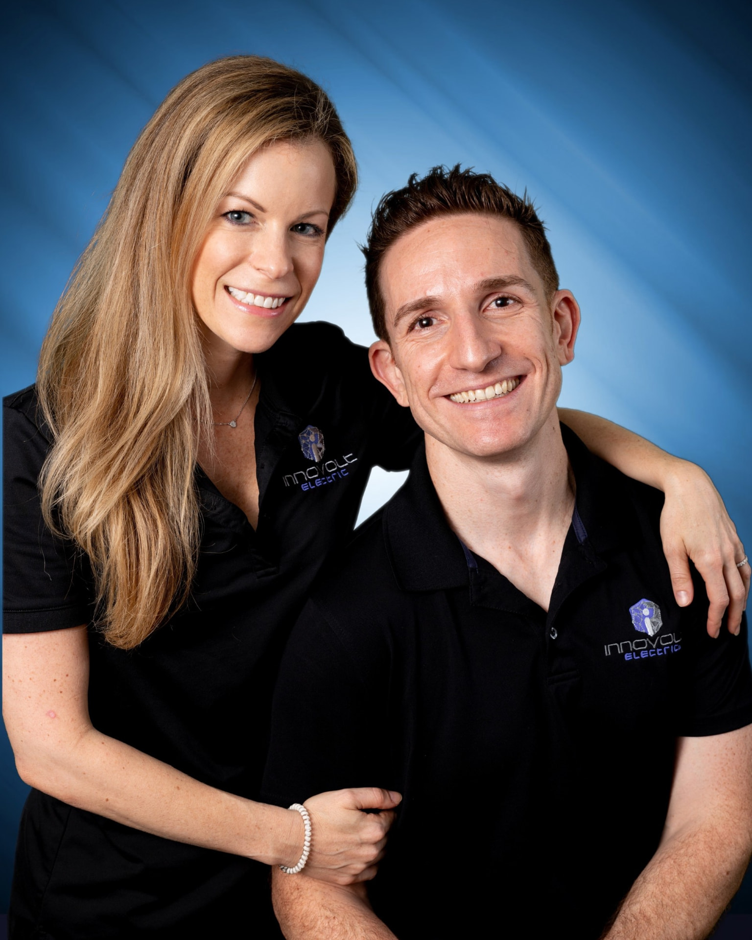 Innovolt Electric team members in company polo shirts